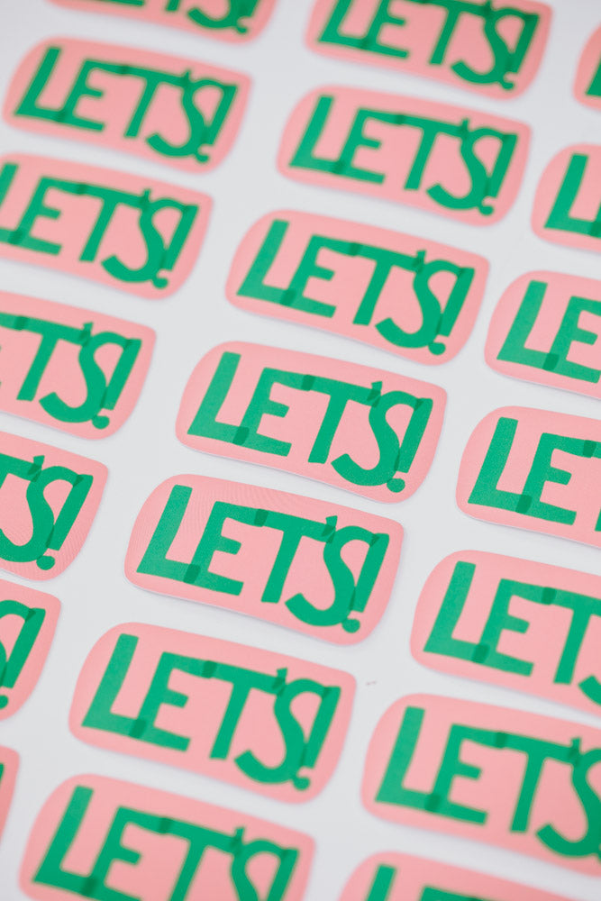 The image shows multiple "Let's!" stickers in a grid arrangement. The stickers have a pink background with green text.